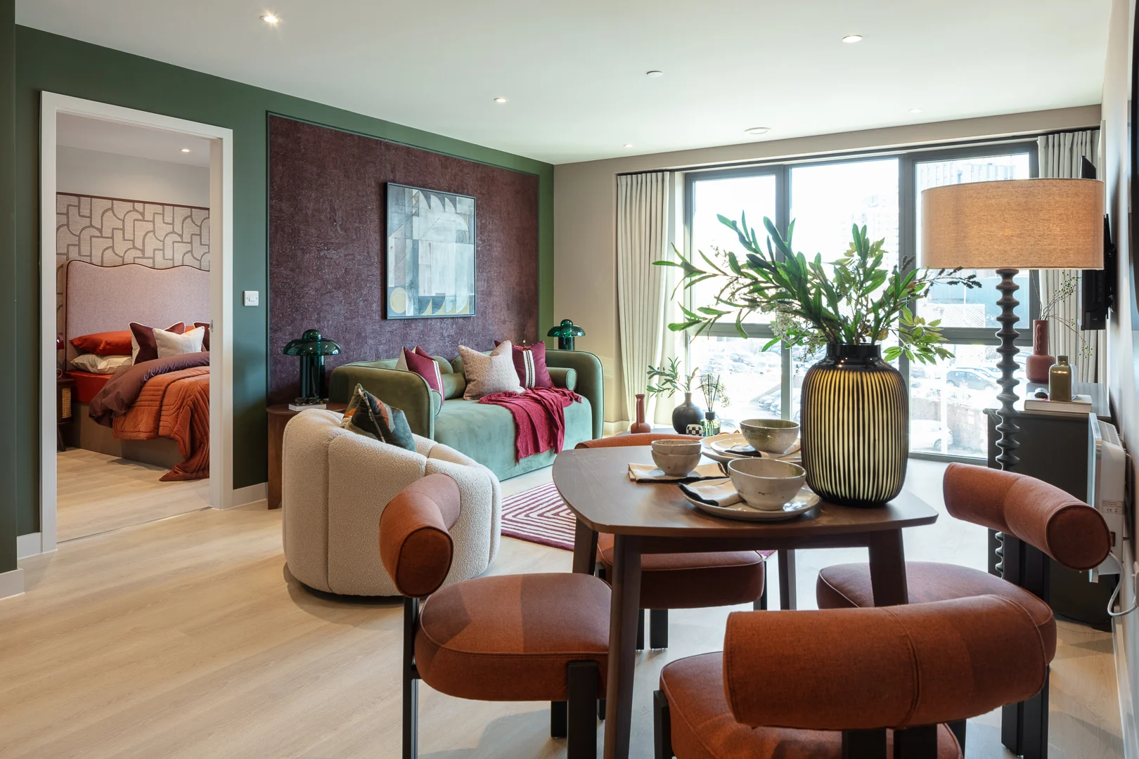 Modern living room with dining table and plants