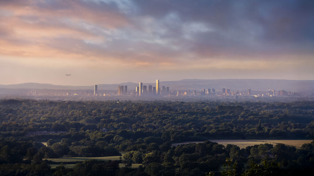 City skyline with sunset and forests