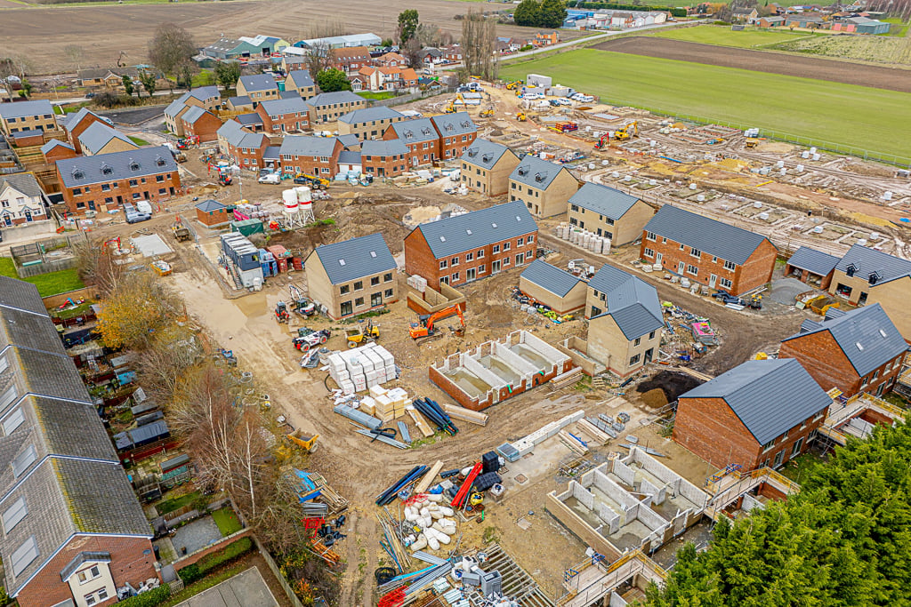 Aerial view of residential housing construction site.